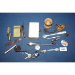 A small box of miscellanea including silver mounted items, page marker, hat pin,