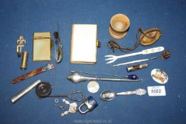 A small box of miscellanea including silver mounted items, page marker, hat pin,