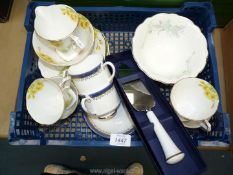 A quantity of part teasets including Royal Albert 'Primrose', 'Sandringham' cups and saucers,