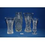Four glass vases including footed, cut detail etc, largest 10'' tall.