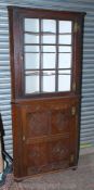 A 19th c. Oak full height Corner Cabinet on Cupboard