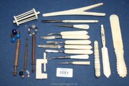 Various bone or wooden sewing/domestic accessories including a sewing clamp, needle cases,