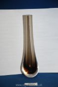 A small glass Caithness bud vase in brown gradient.