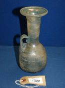 A large Roman glass jug, believed to be ancient, probably 2nd-3rd c.