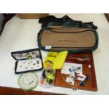 A box of Fishing tackle including Ron Thompson fishing bag, black zip fly case and flies,