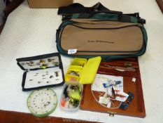 A box of Fishing tackle including Ron Thompson fishing bag, black zip fly case and flies,