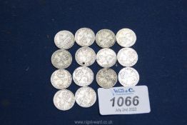 Fourteen silver threepence pieces.