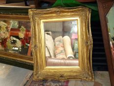 A wall mirror with heavy gilt frame 26" x 22".