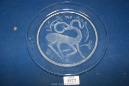 A Lalique Christmas 1968 plate.