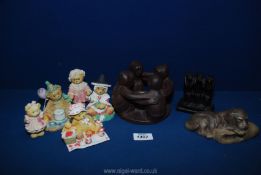 Small quantity of china teddies, Poole dog on cushion, monkeys, and a pottery night light holder.