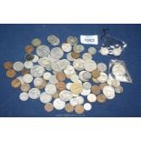 A quantity of foreign coins including 'Eire', Francs, Canada etc.