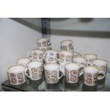 A part Wedgwood Susie Cooper design teaset with twelve cups, three saucers, six coffee cans,