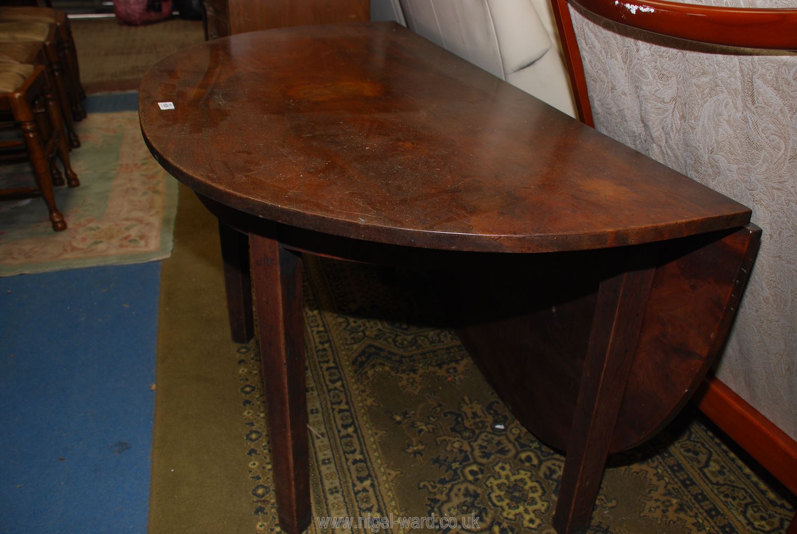 A most unusual and surprisingly heavy Mahogany demi-lune side Table with a rear hinged drop-leaf - Image 2 of 3