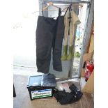 A pair of size 12 thigh waders by Hardwear with size 5XL over trousers,