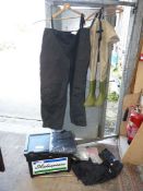 A pair of size 12 thigh waders by Hardwear with size 5XL over trousers,