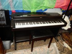 A dark Rosewood finished Roland HP237e Digital Piano having a 6 1/2 octave keyboard and complete