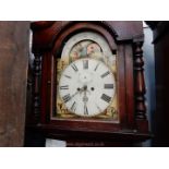 A Mahogany cased eight day longcase Clock having an enamelled/painted face with rolling moon to the