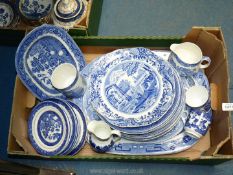 A quantity of blue and white china including Allertons' Willow pattern plates,