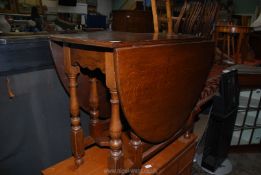 A heavy solid Oak peg-joyned dropleaf gateleg Table, 36'' x 18'' extending to an oval 60'',