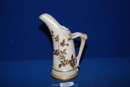 A Royal Worcester 1116 jug/ewer with brown and gold painted leaves on cream ground with antler