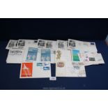 A small quantity of First Day Covers including Around the World,