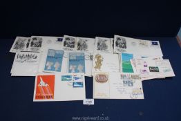 A small quantity of First Day Covers including Around the World,