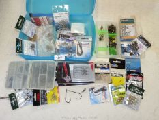 A good quantity of fishing hooks, swivels and split rings etc, most still in their packets.