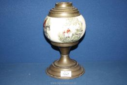 A Victorian Oil Lamp base with pottery reservoir decorated with prints of the hunt, 11' tall.