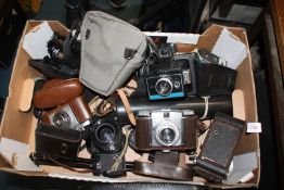 A box of cameras and camera parts including Chinon CE Memotron 35mm SLR camera,
