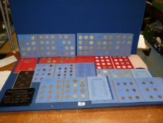 A quantity of coin collection folders (mostly incomplete) including Great Britain Farthings