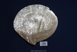 A carved Chinese Mother of pearl plaque, 22 cm diameter.