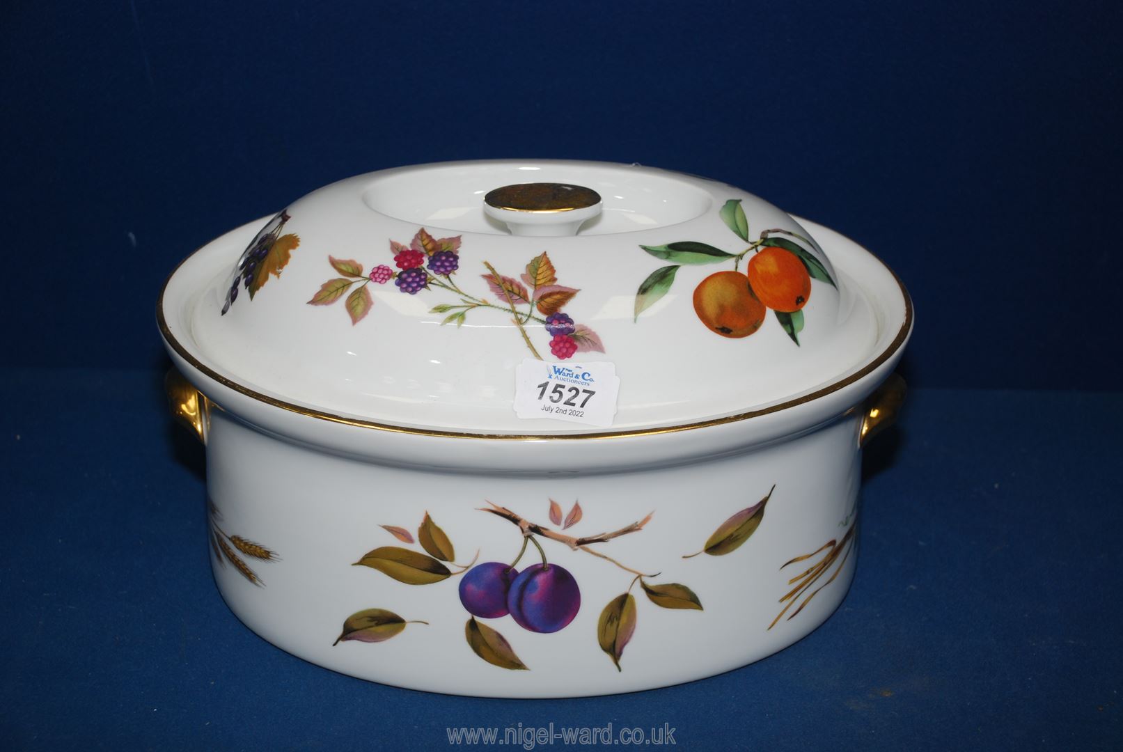 A large Royal Worcester Evesham oval lidded casserole dish.