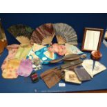 A quantity of miscellaneous items including a small mirror, child's leather gloves, fans, scarves,