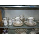 A quantity of Royal Worcester breakfast ware in 'June Garland' pattern including coffee cans, mugs,