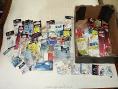 A good quantity of as new rigs and hooks etc for sea and coarse fishing, all in a box.