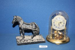 A Koma Anniversary clock under glass dome and a coal ornament of a pit pony.