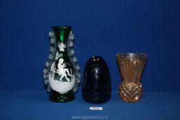 A Mary Gregory vase, blue dump doorstop and a Sowerby Pineapple vase.