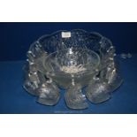 A glass Punch Bowl and Cups.