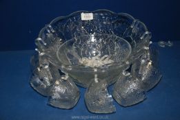 A glass Punch Bowl and Cups.