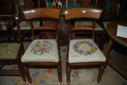A pair of Victorian Mahogany side Chair having turned front legs and drop-in tapestry seats,