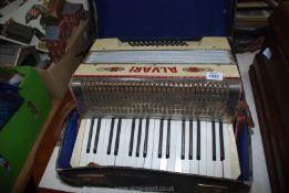 A cased German made embellished Alvari piano accordion, a/f.