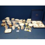 A quantity of small china items to include tea bowls, toast rack etc.