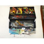 A large two tier Tackle Box and contents of over 50 Devon Minnows and rigs, vintage weights,