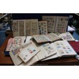 A quantity of folders, albums and stock book with contents including English and foreign stamps.