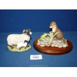 A Border Fine Arts model of an otter (ears a/f) and frog and an English model of a Swaledale ewe