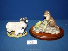 A Border Fine Arts model of an otter (ears a/f) and frog and an English model of a Swaledale ewe