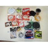 A good quantity of fly fishing beaching line and various weight nylon line, all in a box.