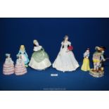 A quantity of figurines including a Royal Crown Derby 'Five' XL11 figure of a man in period dress,