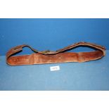 A leather money belt circa 1920's-1930's with original owners name in gilt lettering to the