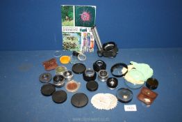 A quantity of camera parts including old lenses, Actina colour lens filter,